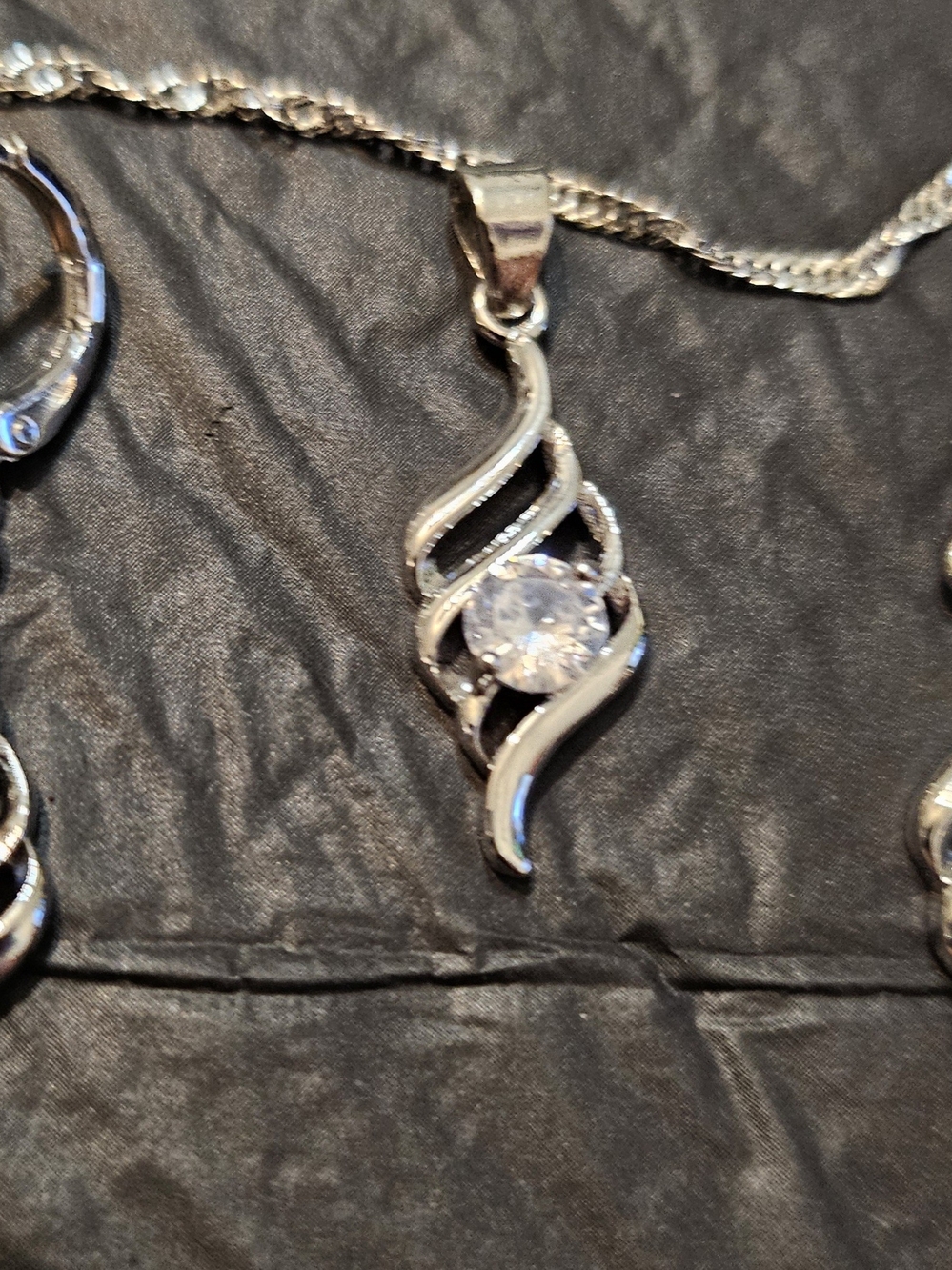 Silver-Tone Swirl Pendant Necklace with Clear Stone
